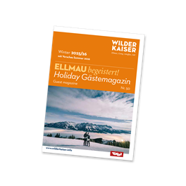 Ein Werbeflyer für das Skigebiet Ellmau mit einer winterlichen Berglandschaft. Im Vordergrund sind zwei Skifahrer zu sehen.