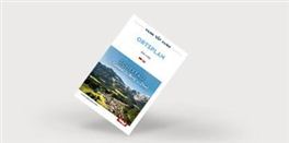 Ein Ortsplan mit einer Abbildung der Landschaft und dem Titel „Sicherfall“. Der Plan ist ansprechend gestaltet und zeigt die Umgebung in lebendigen Farben.