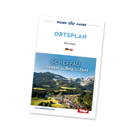 Ein Ortsplan mit einer Abbildung der Landschaft und dem Titel „Sicherfall“. Der Plan ist ansprechend gestaltet und zeigt die Umgebung in lebendigen Farben.