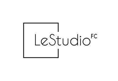 A simple, modern logo of "LeStudio FC" in black on a white background. It features a geometric shape and elegant lettering.