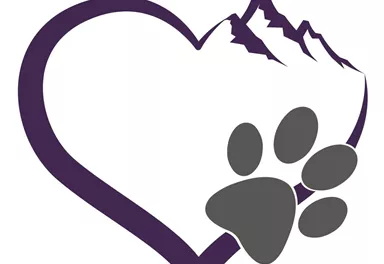 A heart with a mountain silhouette and a paw. The design symbolizes the love for animals and nature.