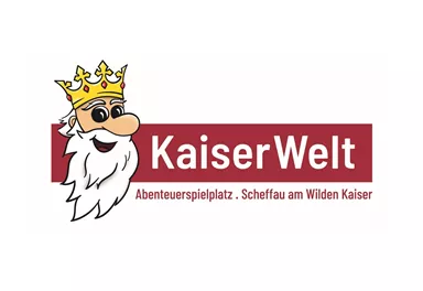 A cheerful logo from KaiserWelt with a smiling king. It represents an adventure playground in Scheffau at the Wilder Kaiser.