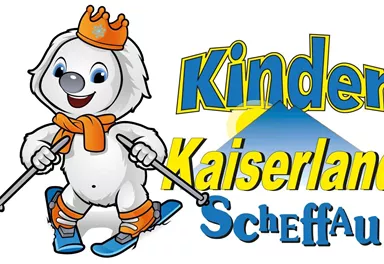A cheerful polar bear in ski gear with a crown. In the background, the text "Kinder Kaiserland Scheffau" is displayed.