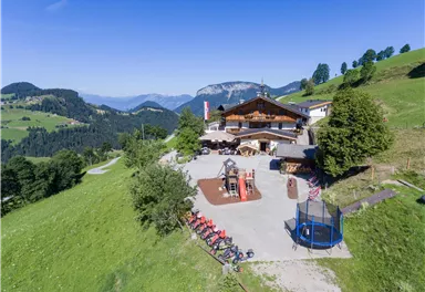 Söll_Alpengasthof Gruberhof im Sommer_Wilder Kaise