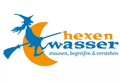 A logo with a witch on a broomstick in front of a half moon. The lettering "hexenwasser" conveys wonder, comprehension, and understanding.