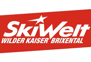 A red logo with the inscription "SkiWelt Wilder Kaiser Brixental". It is designed to represent a ski region in Austria.