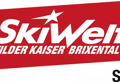 Ein rotes Logo von SkiWelt mit dem Schriftzug "Wilder Kaiser Brixental" und "Söll". Es symbolisiert das Skigebiet und die Aktivitäten im Winter.