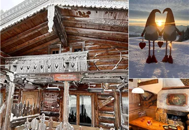 A charming, snow-covered wooden house with a balcony and frozen decorations. The image also features two decorative figures holding a heart, as well as a cozy interior design.