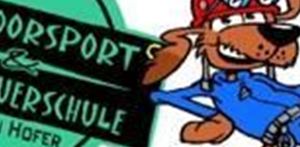 A happy dog in blue gear is giving a thumbs up. In the background is the logo of an outdoor sports and adventure school.