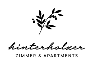 A simple logo with the inscription "hinterholzer Zimmer & Apartments". It features a stylized plant in black.