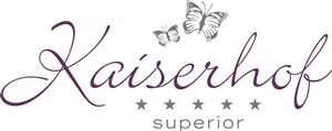 An elegant logo of the Kaiserhof Hotel. It features butterflies and the inscription "Kaiserhof superior".