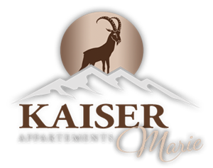 A logo for "Kaiser Appartements Marie" featuring a stylized mountain and a goat. The background shows a circle in soft colors, creating an inviting impression.