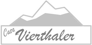 A simple logo with the text "Casa Vierthaler" and mountainous lines in the background. The colors are in shades of gray.
