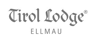 A logo of the Tirol Lodge in Ellmau. It features the name in elegant font.