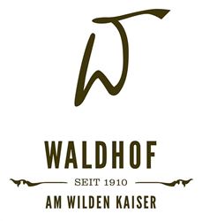 The logo of Waldhof features a stylized "W" in brown color. Below it is the inscription "since 1910 at the Wild Kaiser."