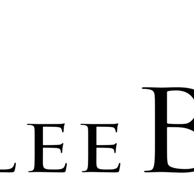 A logo featuring a stylized clover leaf in green color. The text "KleeBlatt" is designed in an elegant font.