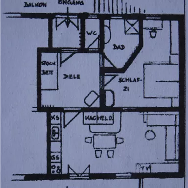 A floor plan of an apartment with different rooms. The main areas are bedroom, living room, kitchen, and bathroom.
