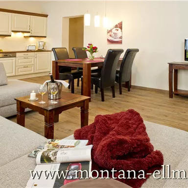 A cozy living kitchen with modern furniture. The room is bright and inviting, ideal for relaxed evenings.