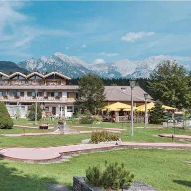 A beautiful hotel in a quiet location with a view of the mountains. The garden area features a mini-golf course and plenty of green space.
