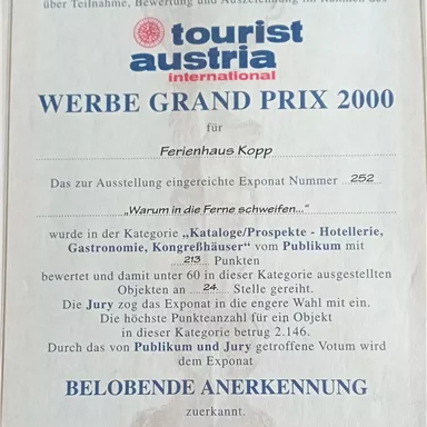 A certificate that awards the "Advertising Grand Prix 2000" to the Kopp vacation home. The award comes from Tourist Austria and highlights the achievements of the property.